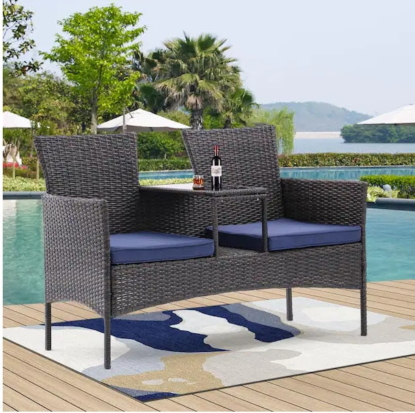 All Weather PE Wicker Outdoor Patio Couch with Built-in Tempered Glass Coffee Table and Removable Blue Cushion. 1,235 units. EXW Los Angeles $50.00 unit.