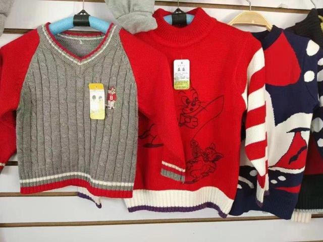 Used sweaters for children and adult