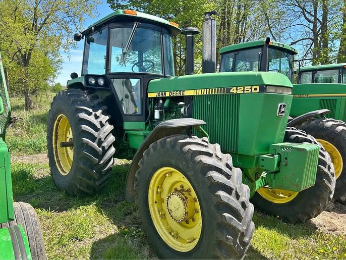 (2) John Deere 4wd Tractors